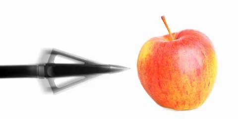 Shooting an apple Stock Photos