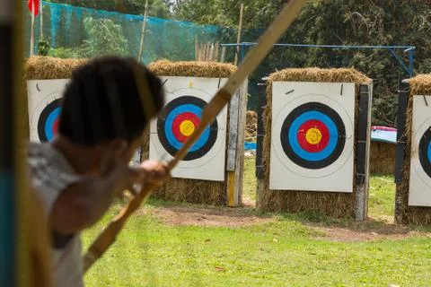 Shooting arrow bow to target Stock Photos