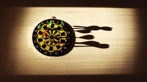 Shooting arrows game with lights and shadows Stock Photos