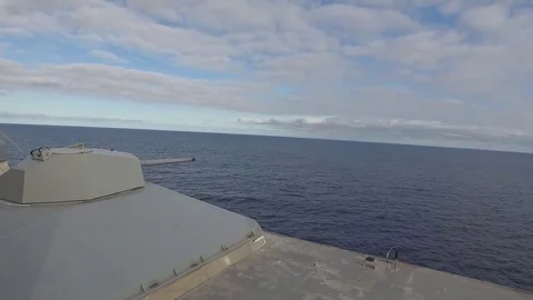 Shooting from an automatic ship cannon at a target Stock Footage 121028076