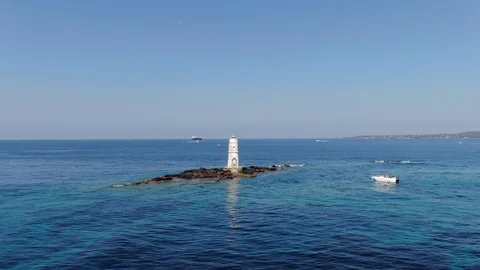 Shooting back of the lighthouse on the coast of Sardinia Stock Footage 115436472