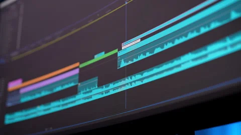 Shooting from below of video editing on ultrawide monitor computer and capture Stock Footage 276238959