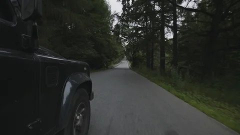 Shooting from the body of a moving car. View of the road. Stock Footage 94251253