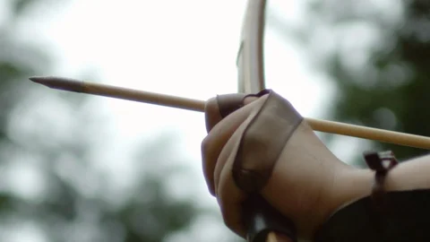 Shooting with bow and arrow, Ultra Slow Motion Stock Footage