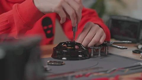Shooting of Caucasian guy working on drone. Close-up footage of male hands Stock Footage 195277079