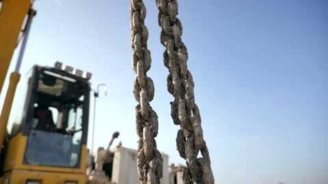 Shooting the chain of the tractor connected to the bucket in full size 스톡 동영상 142495129