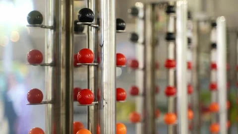 Shooting at the colored balls at a fairground Stock Footage 324755494