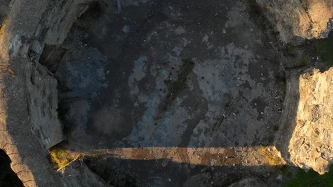 Shooting with a copter 4K video of an ancient fortress outside the city Stock Footage 116554336