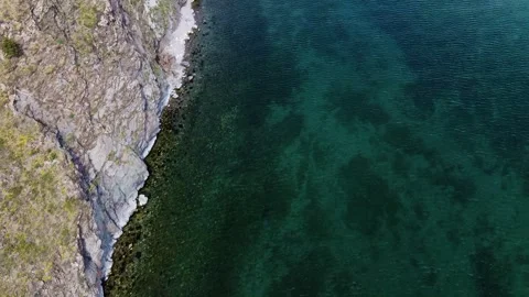 Shooting from the copter to the shore of lake Baikal Stock Footage