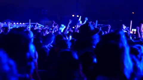 Shooting of the Crowd dancing during the concert in the darkness Stock Footage 98222589