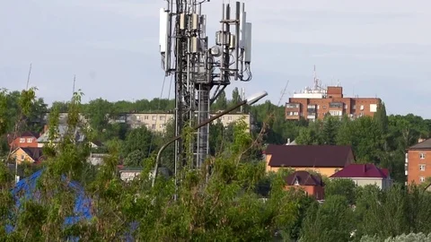 Shooting a distant provincial town on the background of trees Stock Footage 75964692
