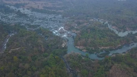 Shooting from the drone fly over the natural stream from Khone Falls waterfall. 스톡 동영상 101934845
