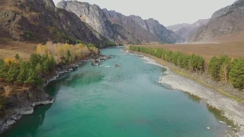 Shooting from a drone flying over a mountain river. Stock Footage 311700313