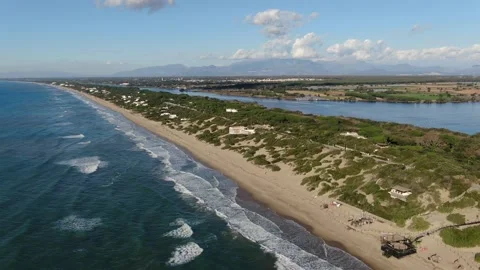 Shooting with a drone Sperlonga beach house on the sea Stock Footage 147673959