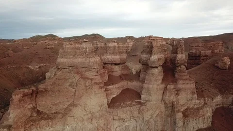 Shooting from a drone, top view of Charyn canyon. Red canyon, Martian view. Video stock 97357355