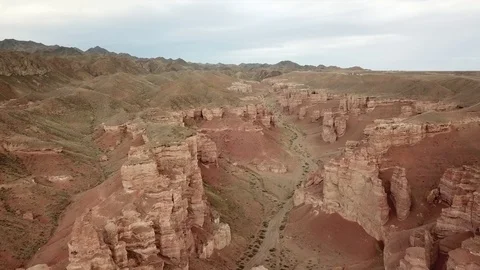 Shooting from a drone, top view of Charyn canyon. Red canyon, Martian view. Stock-Footage 97357372