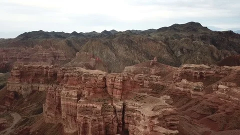 Shooting from a drone, top view of Charyn canyon. Red canyon, Martian view. Stock Footage 97357411