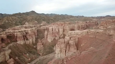Shooting from a drone, top view of Charyn canyon. Red canyon, Martian view. Video stock 97357423