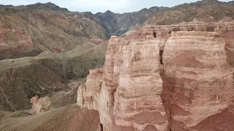 Shooting from a drone, top view of Charyn canyon. Red canyon, Martian view. Video stock 97357426