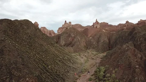 Shooting from a drone, top view of Charyn canyon. Red canyon, Martian view. Stock Footage 97357447