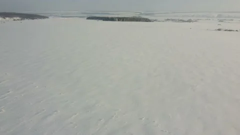 Shooting from a drone in winter forests and fields. Stock Footage 170930548
