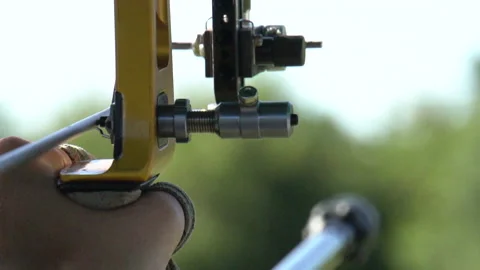 Shooting during olympic archery target practice, close up slow motion shot Stock Footage 148646262