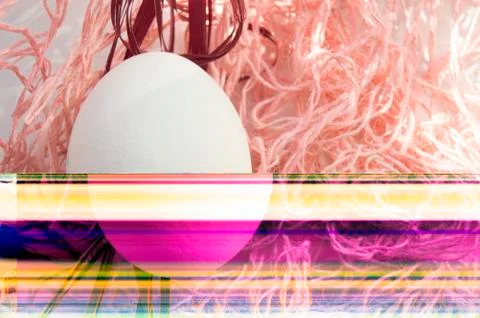 Shooting Easter, one egg on a pink background - damaged file. Abstract textur Stock Photos