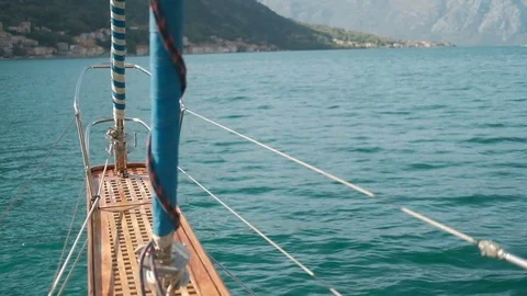 Shooting front part moving boat on lake, trip through water outdoors Stock Footage 76200219