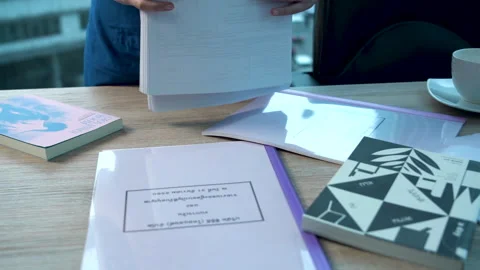 Shooting front view, in front of the desk, moving the camera to the maid. 库存影片 140629085