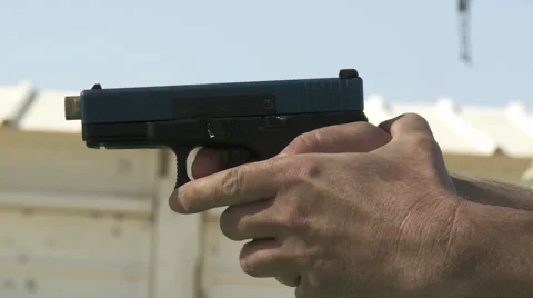 Shooting a gun Stock Footage 65821114