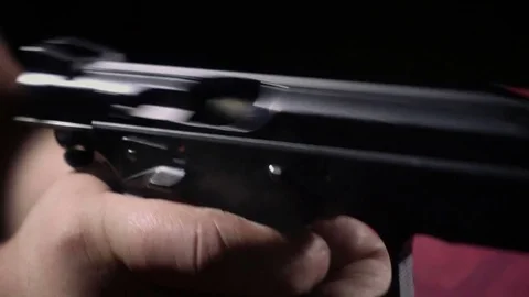 Shooting handgun Stock Footage 82709196