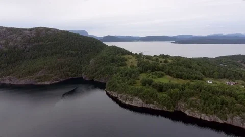 Shooting from helicopter beautiful island covered green plants, in the Stock Footage