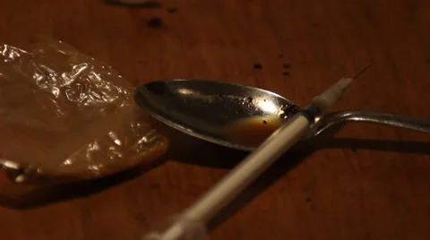 Shooting up heroine Stock Footage 28838716