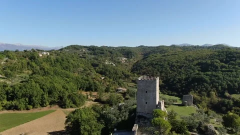 Shooting with lateral drone to the tower of the acropolis of Civitavecchia Arpin Stock Footage 147384025