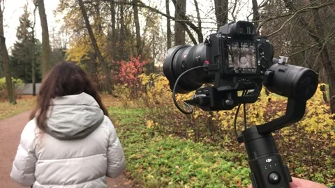 Shooting a model on a steadicam Stock Footage 144014646