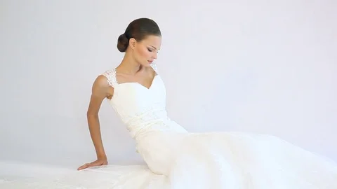 Shooting models in the studio on white background Stock Footage 71589166