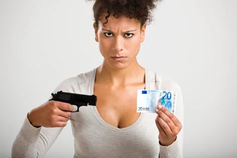 Shooting money Stock Photos