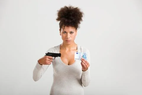 Shooting money Stock Photos