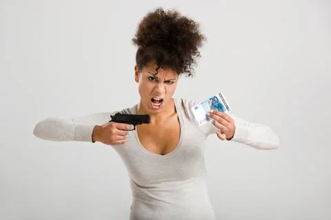 Shooting money Stock Photos