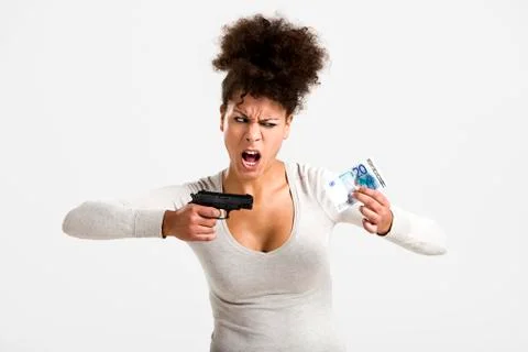 Shooting money Stock Photos