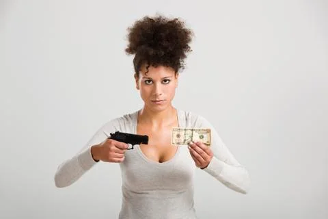 Shooting money Stock Photos