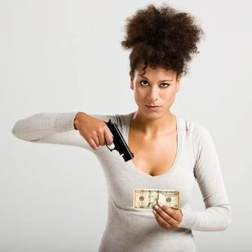 Shooting money Stock Photos