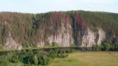 Shooting of a mountain range with a camera turning to the left. 스톡 동영상 116605185
