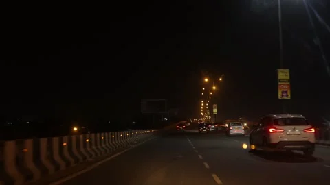 Shooting night view Traffic on rainy day from a cracked windshield. Stock Footage 245106544