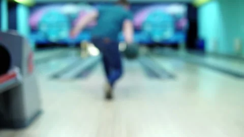 Shooting out of focus. Man throwing a bowling ball Stock Footage 147622487