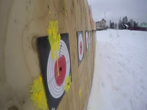 Shooting paintballs balls at targets Stock Footage 76364041