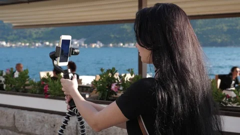 Shooting on the phone fixed to the stabilizer Stock Footage 90819241