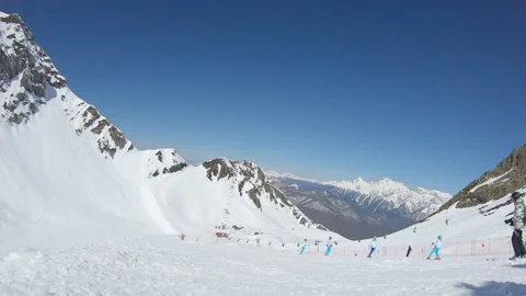 Shooting plan with passing snowboarders and skiers Stock Footage 149259103
