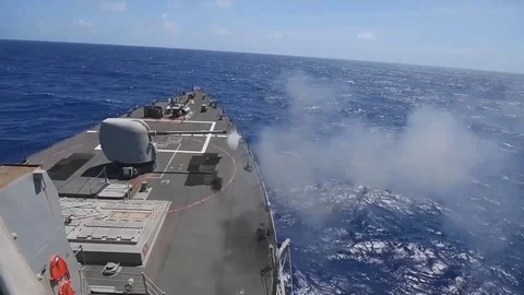 Shooting from a Powerful Large-Caliber Ship Cannon Stock Footage 121030574
