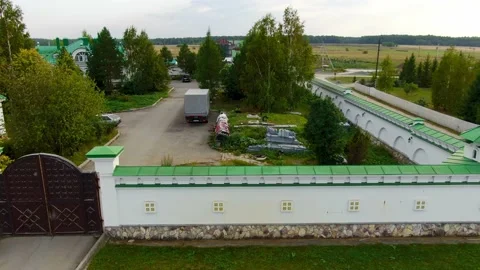 Shooting from a quadcopter part of the monastery wall Stock Footage 160066197